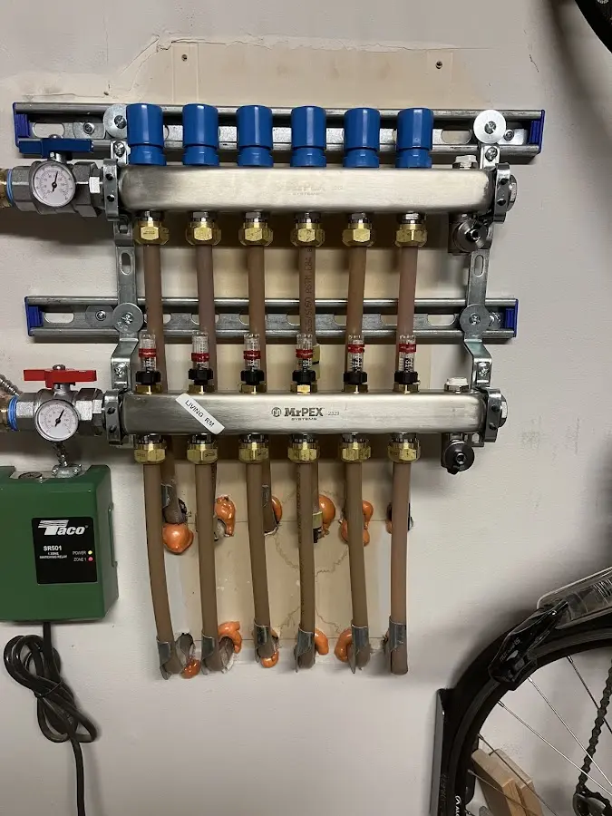 Plumber performing Water Heater Repair at a residential property in Rutland